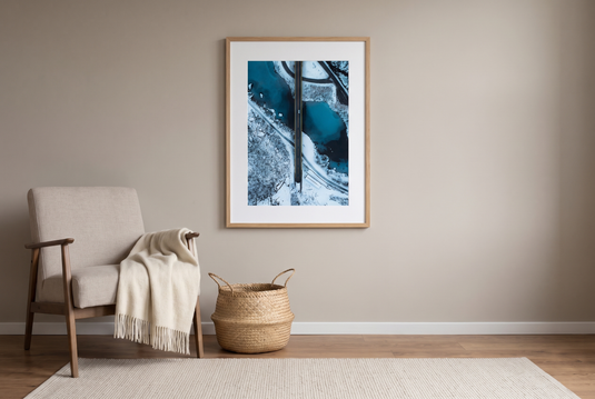 Norway winter aerial print framed in a cosy reading corner