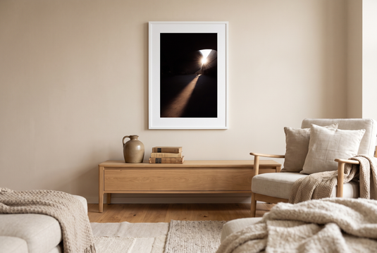 Seoul fine art print framed above an oak console in a warm lounge