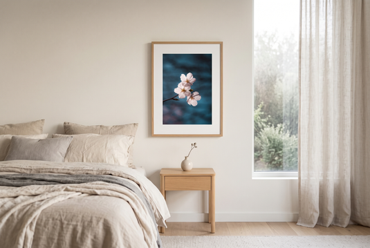 Cherry blossom wall art print framed in a serene bedroom